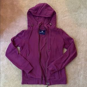 Martin and Osa purple sweatshirt